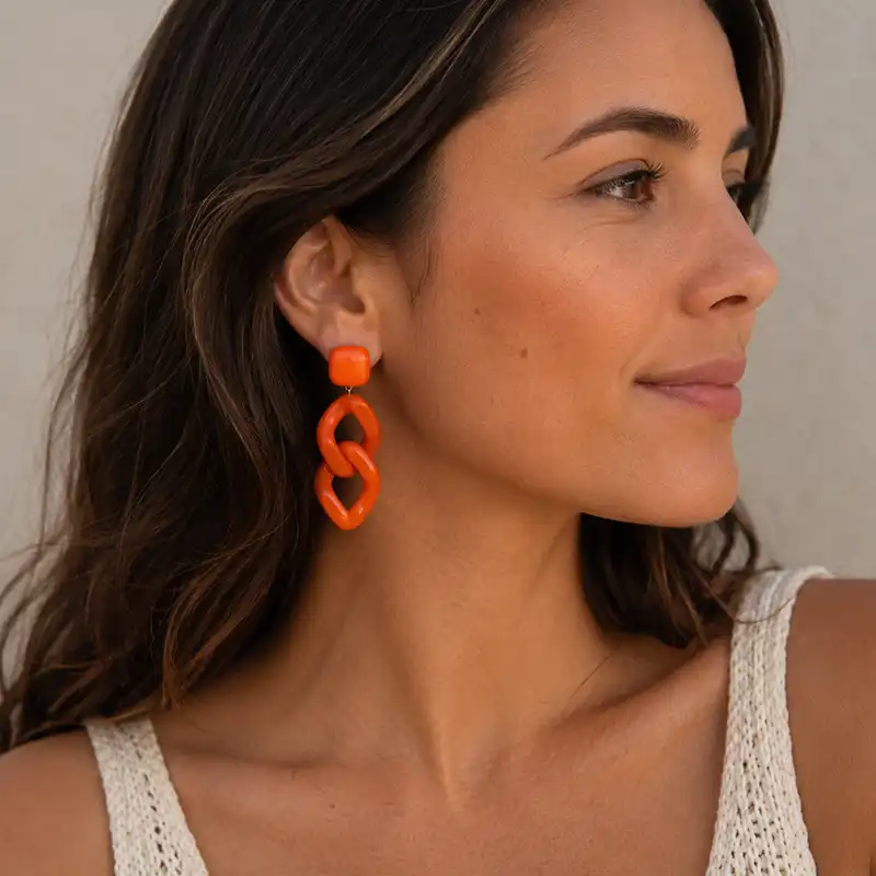 boucles-oreille-clip-maillons-orange Boucles d'oreilles à clip à maillons oranges Francine Bramli