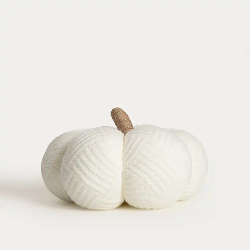 Citrouille en tissu blanc